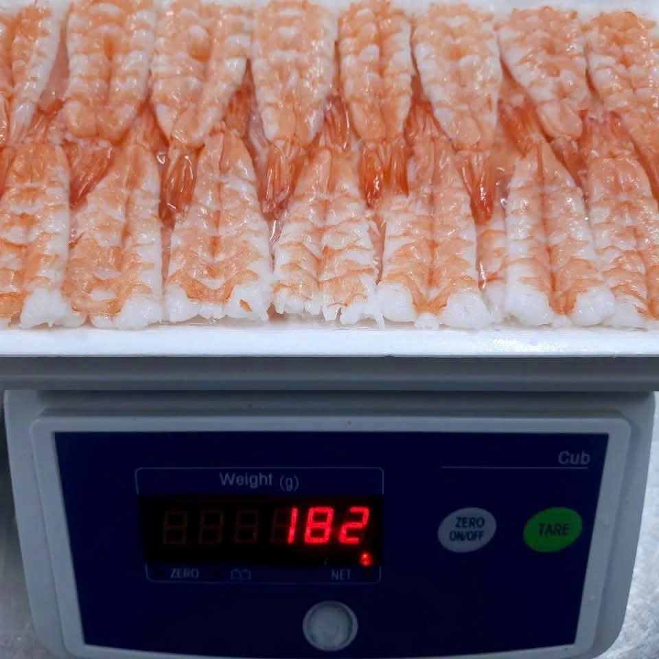Cooked shrimp tray on the scale